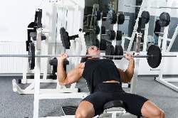 man-doing-bench-press-middle-position