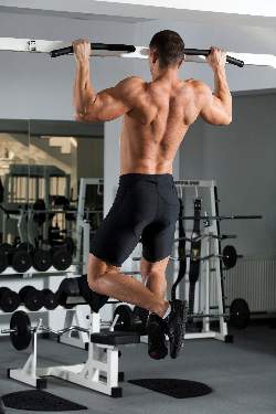 man-doing-pulls-ups-middle-position